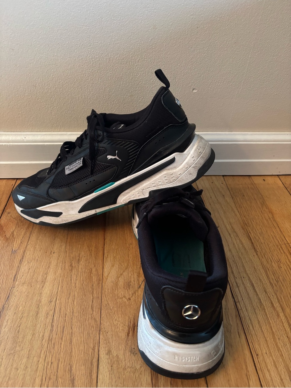 Puma Men's Mercedes AMG
PETRONAS  F1 Sneakers black Size
13